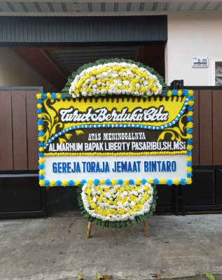 Papan Bunga Duka di Dembe Jaya